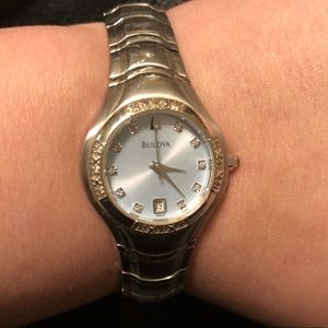 Bulova blue-faced with diamonds woman’s watch